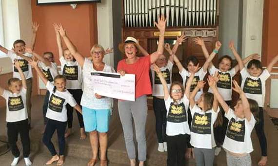 Delight as Bright Sparks receive cheque for £2,000