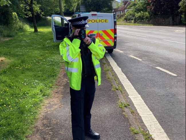 Police officer with speed gun