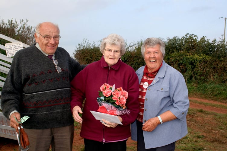 Bonzo and Joyce with Sheila Kerslake, then ploughing match secretary, on their 57th wedding anniversary.  SR 9971
