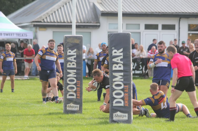 Fly-half Glenn Coles, pictured scoring against Old Centralians back in September, will start at fly-half for Launceston at Drybrook tomorrow. Picture: Paul Hamlyn