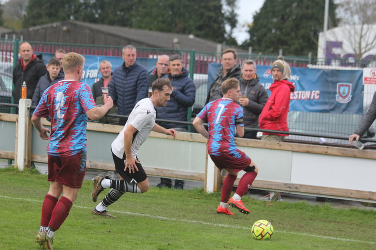 Launceston's Mark Wilson (2) and skipper Mike Steele (7) in action against Penzance on Saturday.