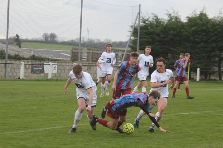 Action from Launceston against Bodmin Town in SWPL Premier West on Saturday. Town are pictured in white.