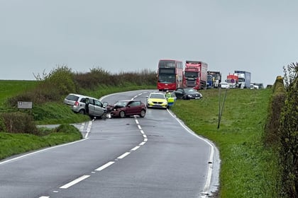 Road closed for hours following multi car collision 