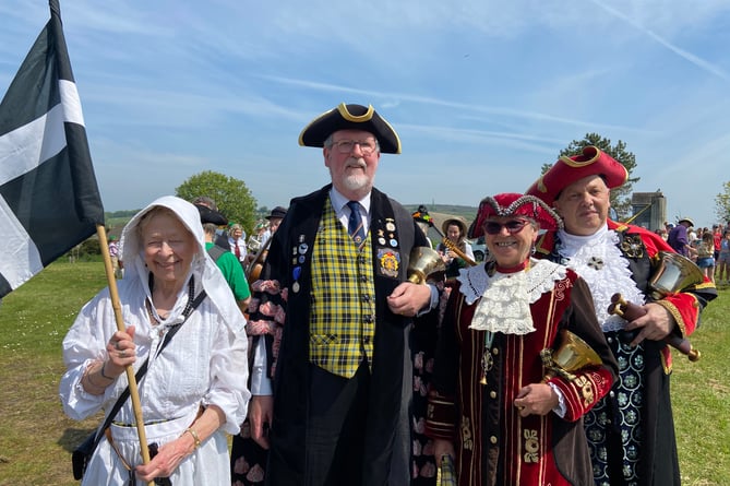 From left, Pat Tremain, Robert Tremain, town crier of Launceston, parish crier of Calstock Hilary Fairhurst and Callington town crier Tony Stentiford, at Callington MayFest