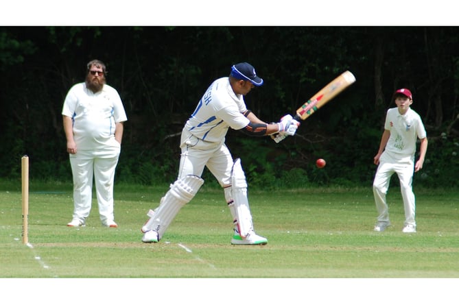 Gunnislake skipper Dinesh Thirupuvanarajah hits out during his knock of 34 against Werrington on Saturday. Picture: Brian Martin