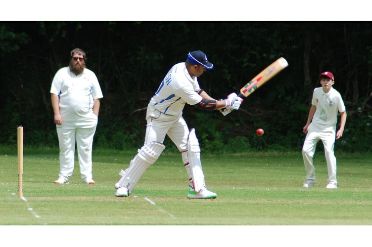 Gunnislake skipper Dinesh Thirupuvanarajah hits out during his knock of 34 against Werrington on Saturday. Picture: Brian Martin