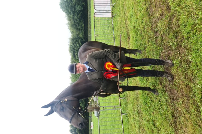 Sarah Ford of Liskeard with her two year old Irish Draft x Thoroughbred 'Cool Time Joker'. Sarah described him as a "full time joker" but his lively spirit had paid off in the ring when he was awarded champion sports horse. (Picture: Elias O'Neill)