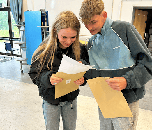 Students anxiously awaited envelope opening time 