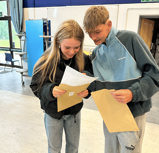 Students anxiously awaited envelope opening time 