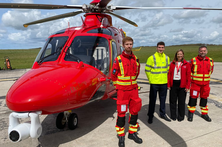 From the left, Critical Care Paramedic Will Damerell, in flight suit, with Jordan Fortune from National Highways, Cornwall Air Ambulance Fundraising Officer Julia Jeffery and Air Operations Officer Steve Garvey