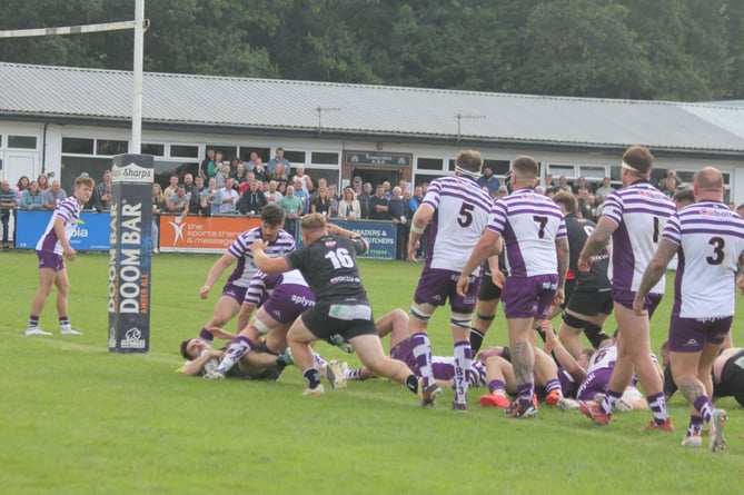 Winger Ollie Bebbington, pictured scoring, made it six tries in three games against Exmouth. Picture: Paul Hamlyn