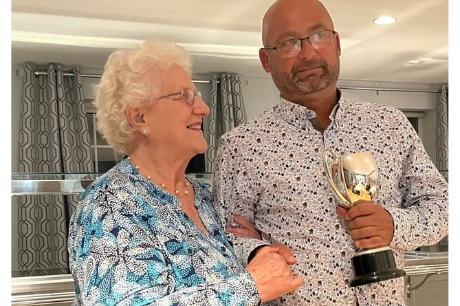 Matt Chatfield was presented with the Harry Baker Cup for the Clubperson of the Year award by Carol Baker. Picture: Werrington CC/Liz Hodgson