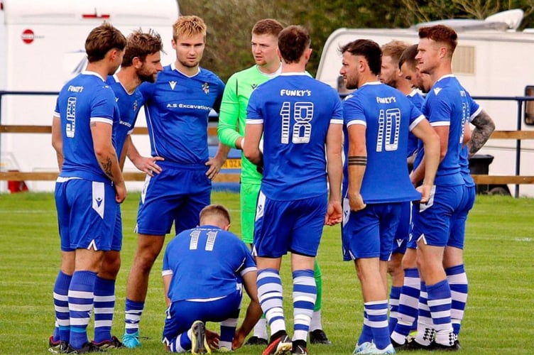 Bude Town's players gee themselves up. Picture: Chris Pointer