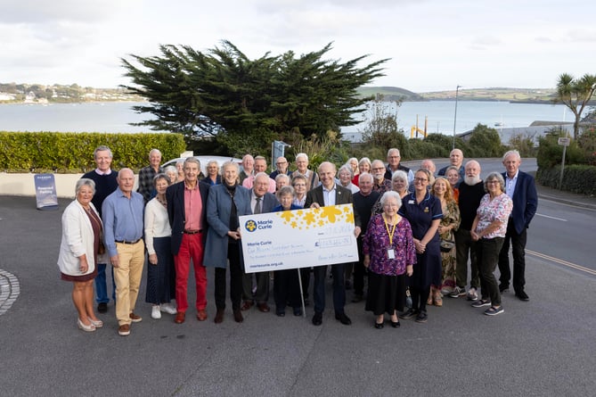 Marie Curie raise over Â£1M for Padstow to Rock swim, presentation by CEO Matthew Reed. Outgoing committee chairman Peter Tamblin, Lynda Thomas