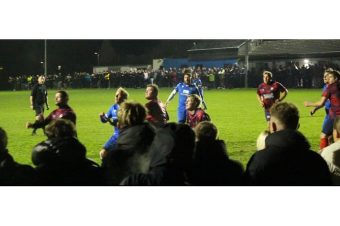 All eyes on the ball as Bradworthy prepare to defend a ball into their box. Picture: Bude Town AFC