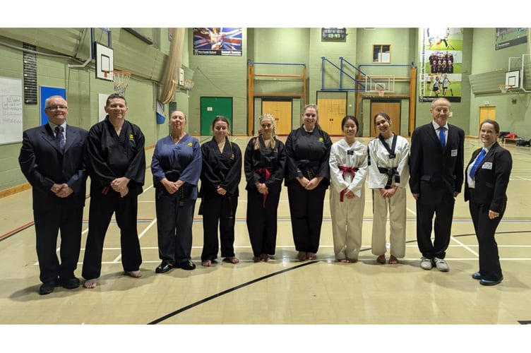 From left: Guy Southard (instructor), Ray Colenutt, Lisa Southard, Sienna Richards, Maya Hoddinott, Annabell Warren, Winnie Lo, Asha Partis, Alec Hay and Becky Downs (master of ceremonies). Picture: BOP Tae Kwon-Do