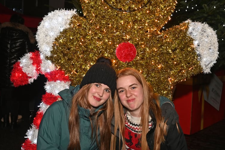 Lilly and Ellie with the Ginger Bread Man in the Town Square