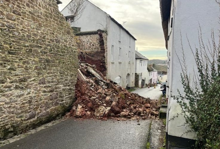 South Street in Hatherleigh covered in debris due to a collapsed wall