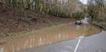 Car abandoned following flooding near A30