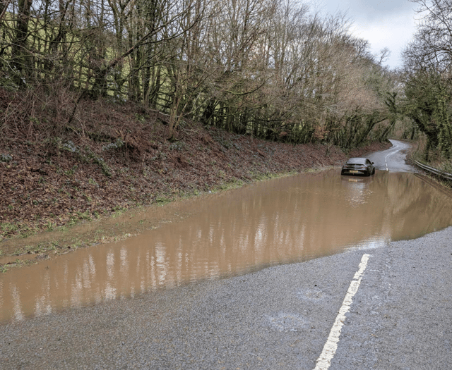 Car abandoned following flooding near A30