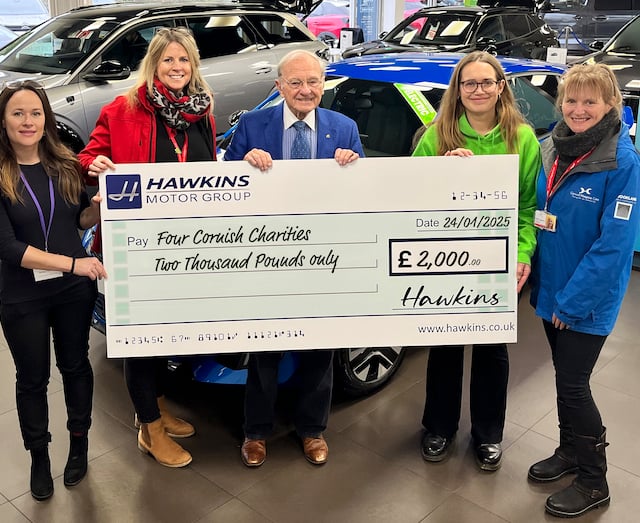 Four charities benefit from motor group cheques